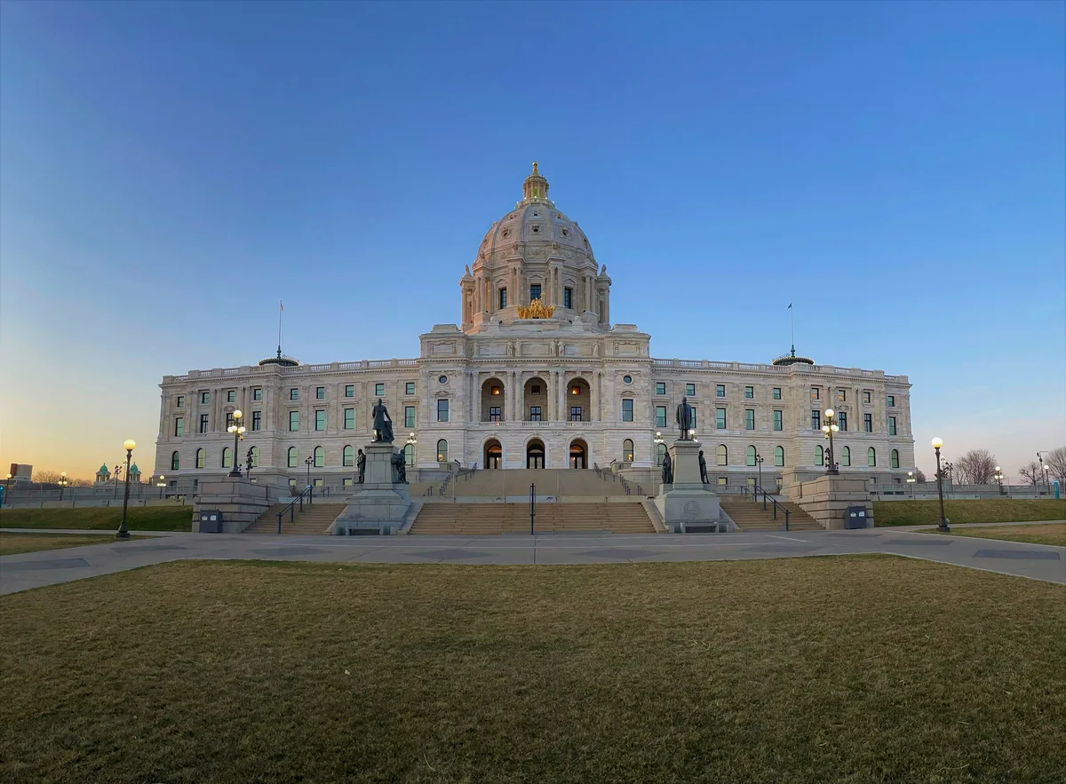 Minnesota State Capitol in Saint Paul beneath a clear blue evening sky