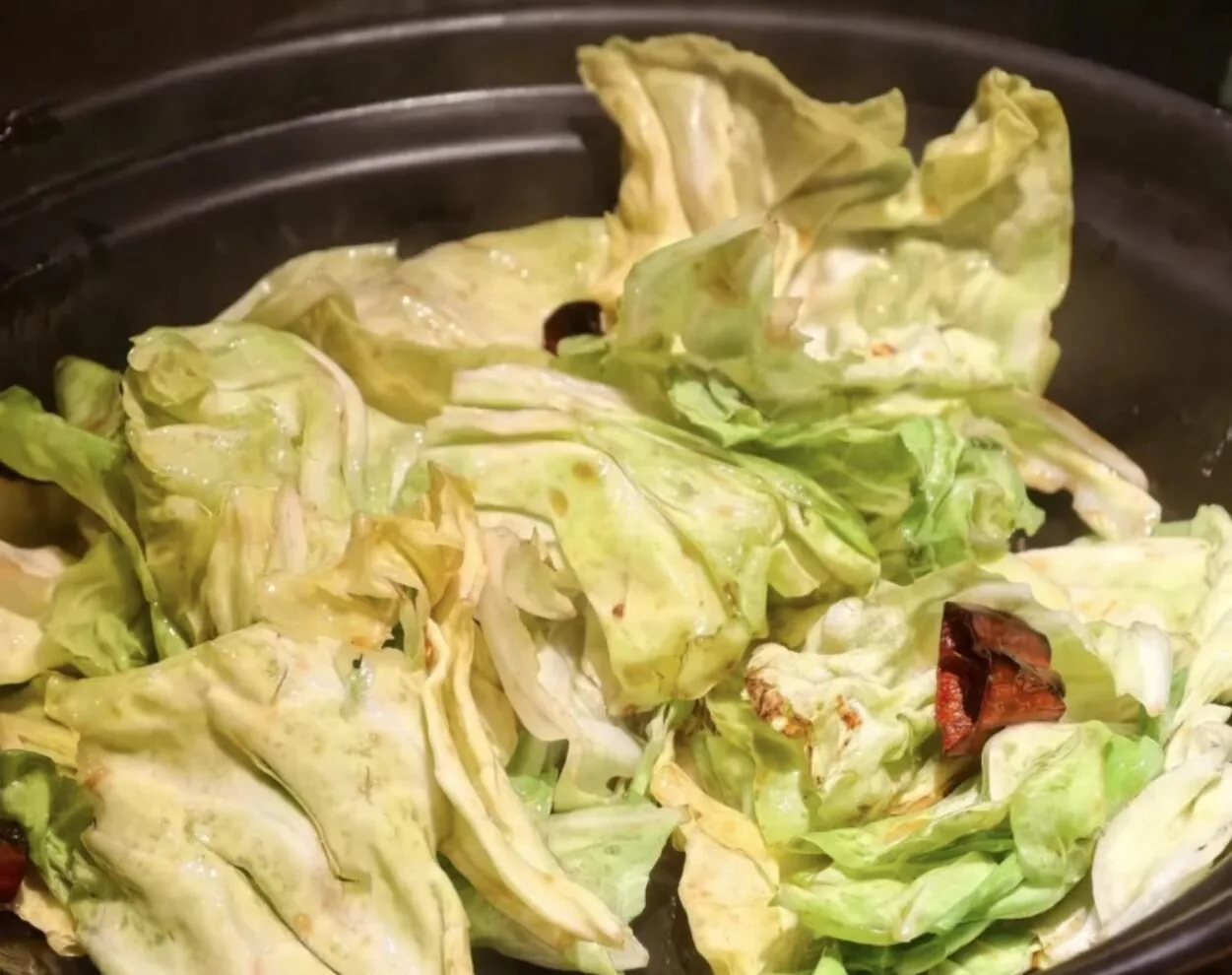 Wok-fried cabbage with pork cracklings and dried chile