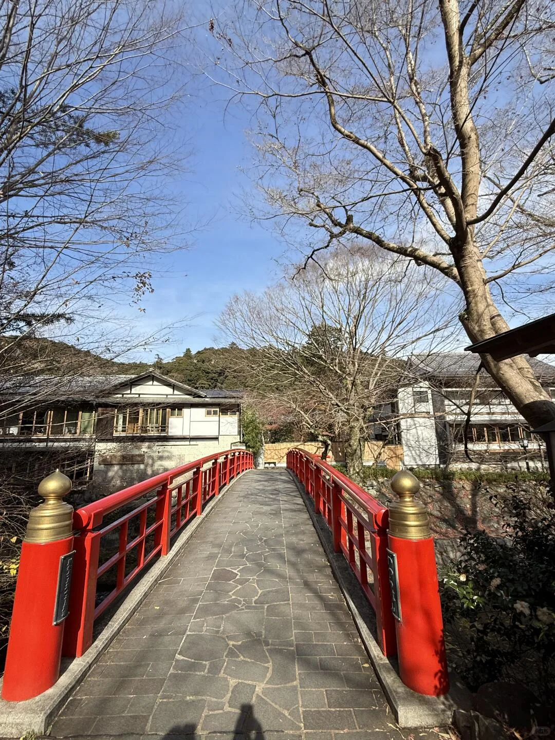 Red bridge crossing the river in Shuzenji