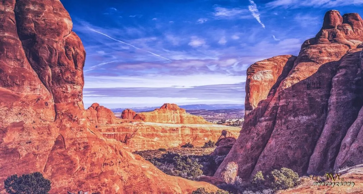 Red-rock canyon and natural arch landscape in Utah